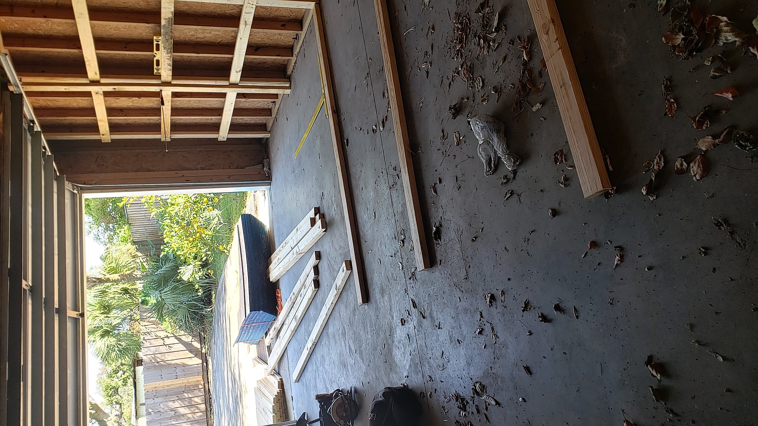 Measuring and mounting wall supports for heavy duty garage shelves